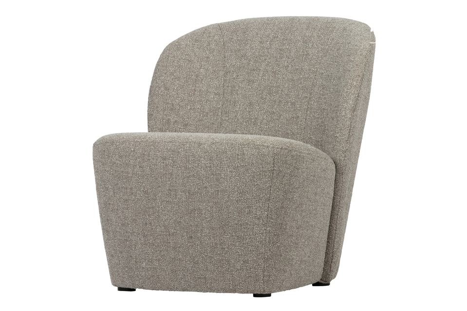 De fijne en elegante beige stoffen fauteuil Lofty uit de VTwonen collectie is gemaakt van 100%