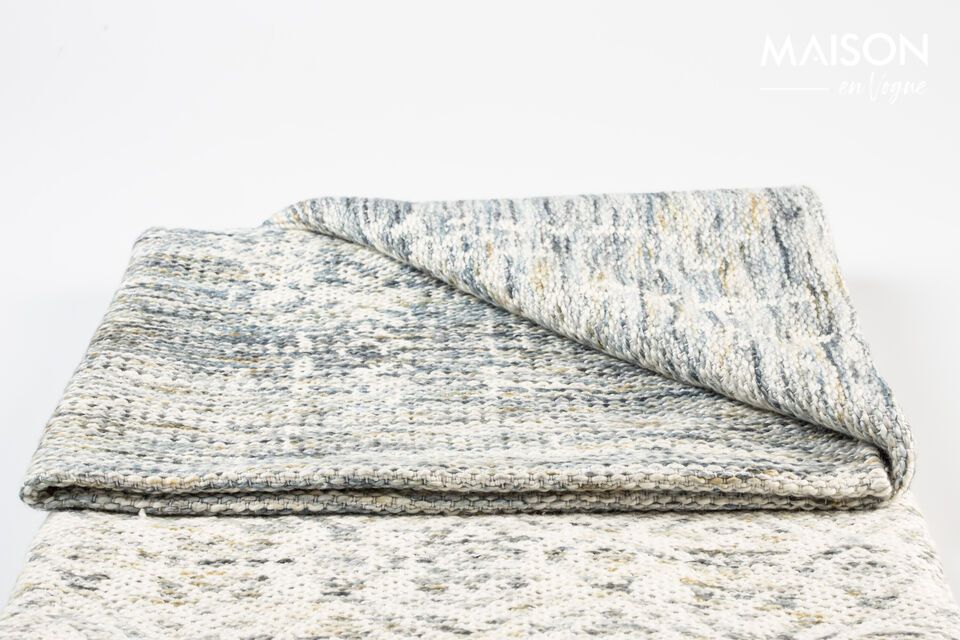 Blijf warm in stijl met deze katoenen plaid.