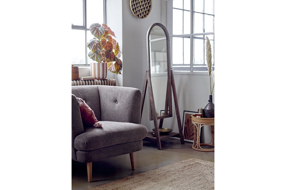 Een Bloomingville fauteuil in een gezellige sfeer