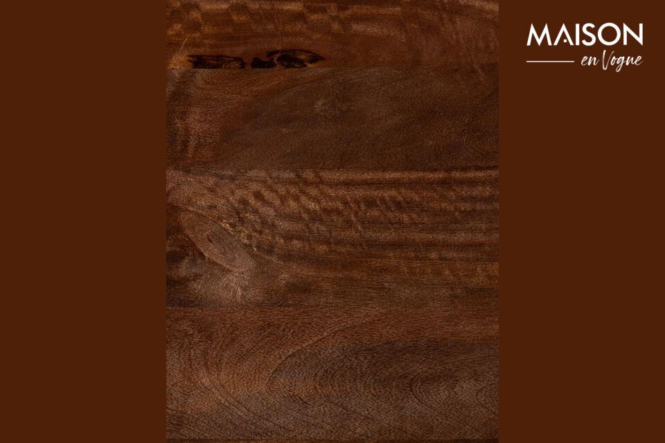 Deze tafel is gemaakt van hoogwaardig mangohout en belooft niet alleen de tand des tijds te