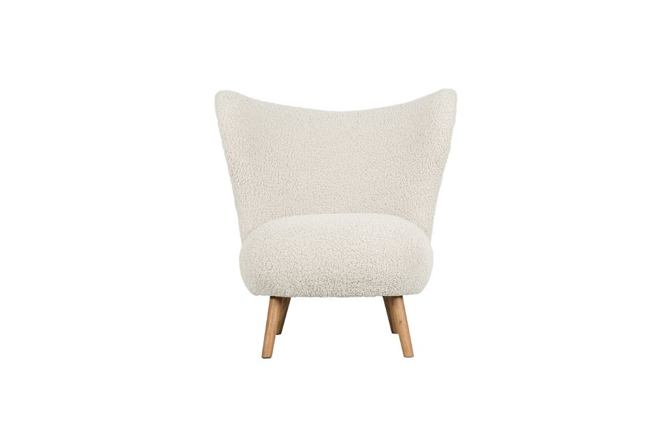 De witte fauteuil met schapenvachteffect van Céline is een zeer aantrekkelijk zitmeubel