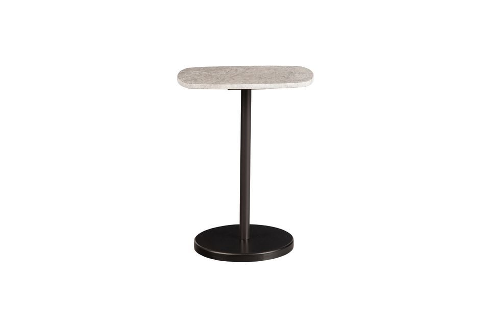Deze salontafel uit de serie Fola heeft een grijs marmeren blad met een uniek ontwerp