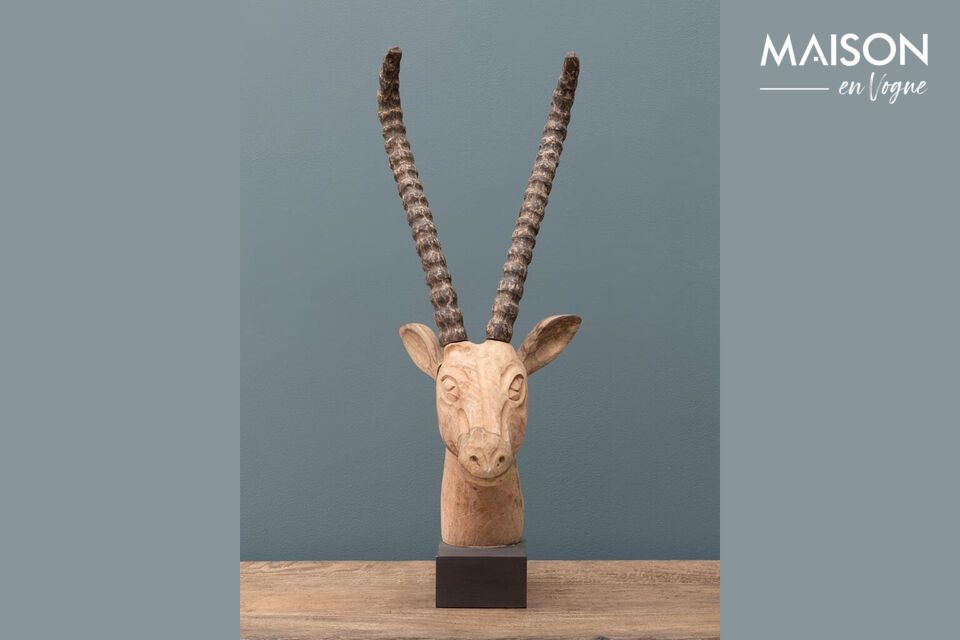 Ontdek de kenmerkende charme en tijdloze elegantie van ons gazellebeeldje van mangohout