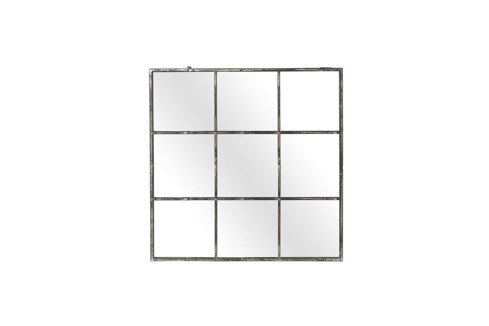 Met zijn rechte hoeken en geometrische vormen is deze spiegel een waar meesterwerk van eenvoud en