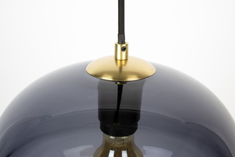 Het grijs van het glas zorgt voor een warme en uitnodigende gloed