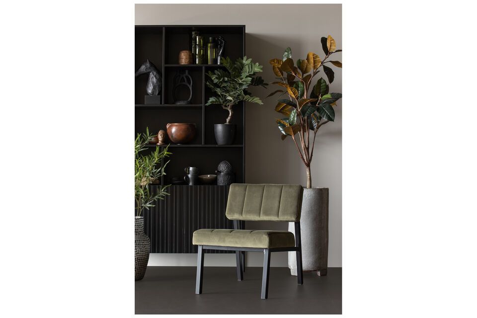 Kaja fauteuil in hout en groen fluweel, comfortabel en design.