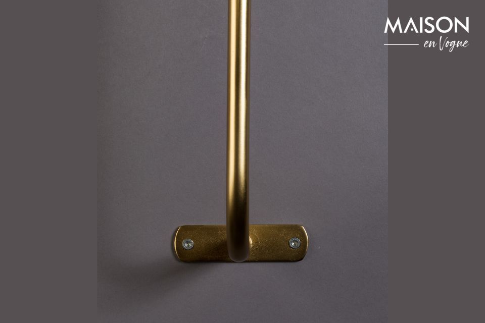 Deze wandlamp met zijn heerlijke retro charme is gemaakt van goudkleurig messing