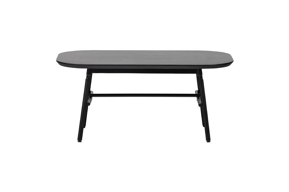 Het tafelblad van de salontafel is gemaakt van mangohout met een mat zwart oppervlak