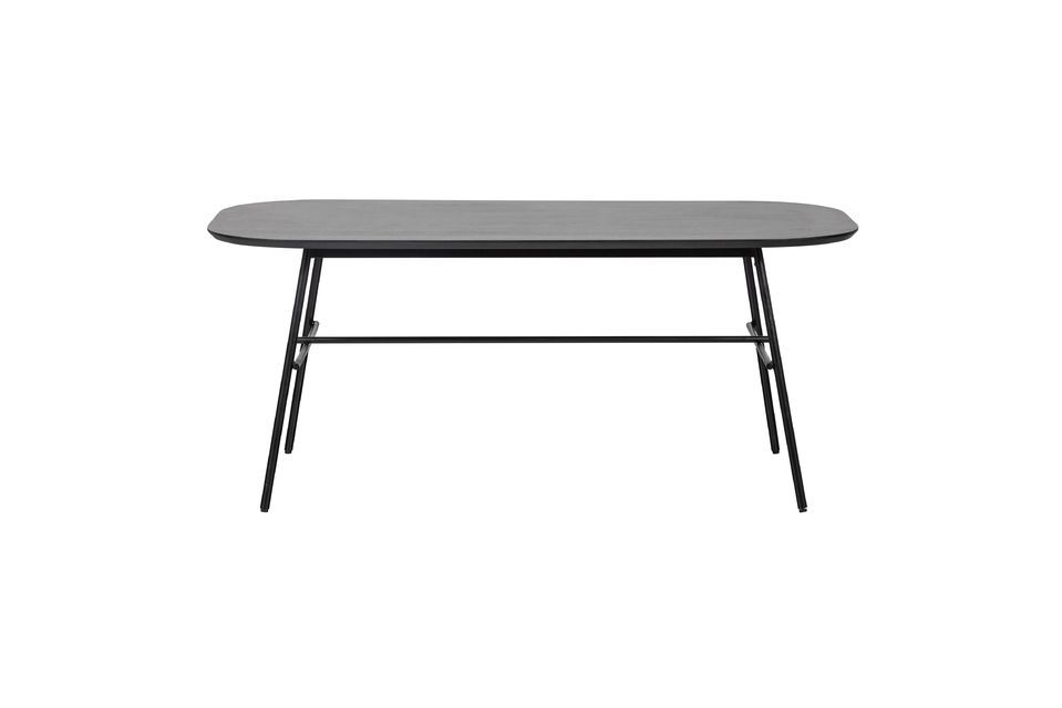De tafel van mangohout en zwart metaal Elegance draagt zijn naam niet voor niets