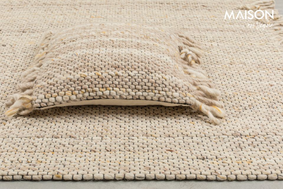 De beige/gele kleur van het Frills tapijt brengt warmte en zachtheid in uw huis
