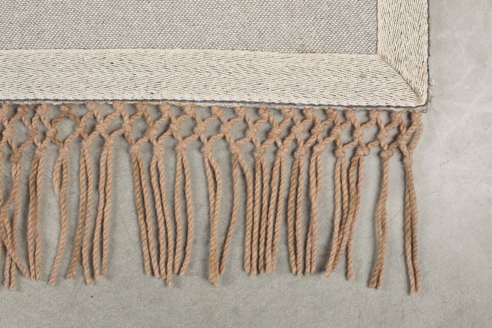 Maak van je huis een warme en uitnodigende ruimte met dit beige wollen tapijt