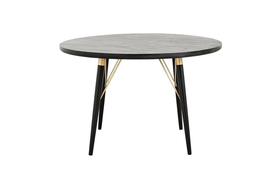 Deze ronde eettafel is voorzien van verfijnde details met prachtig afgeronde spilvormige poten die